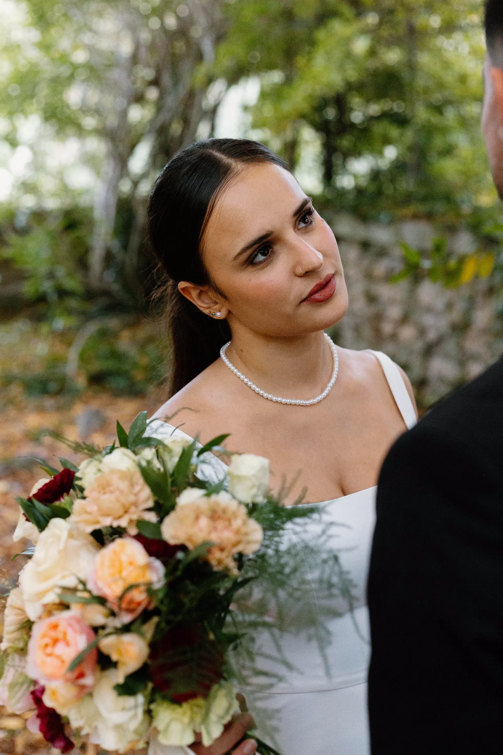 Bride holding a garden-style bouquet